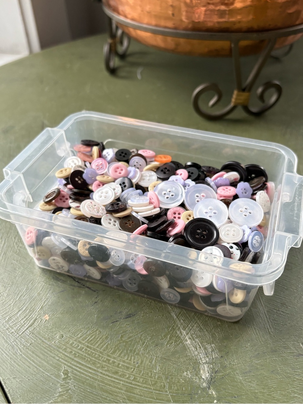 Container full of buttons
